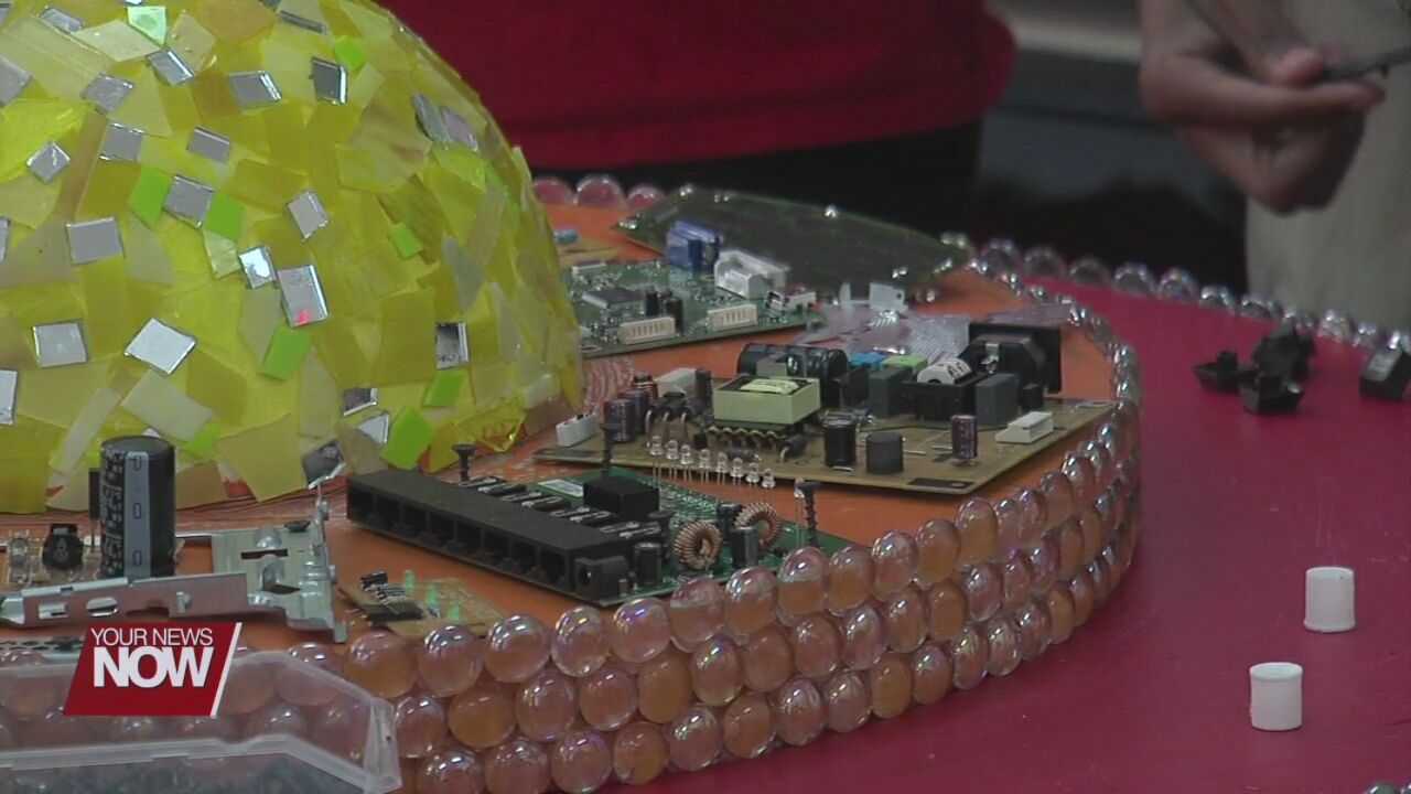 Lima students recycle old computer parts to make unique art